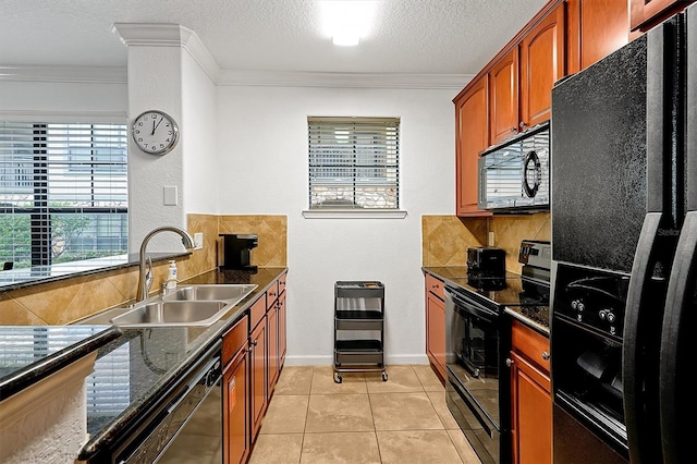 kitchen featuring sink, crown molding, light tile patterned floors, black appliances, and a textured ceiling