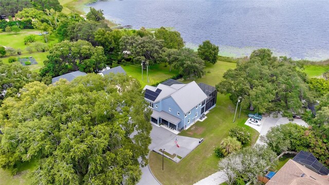 drone / aerial view with a water view