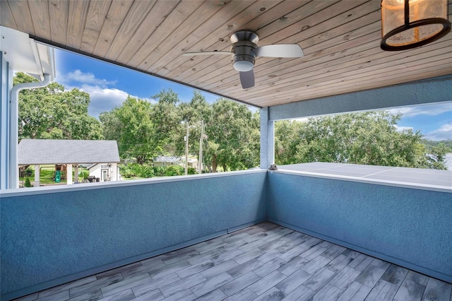 balcony featuring ceiling fan