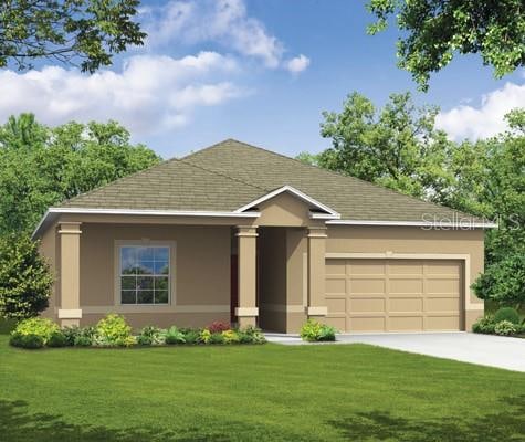 view of front facade featuring a front lawn and a garage