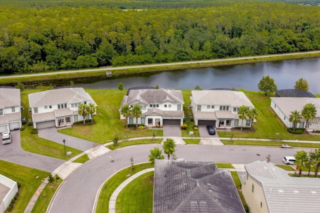 bird's eye view with a water view