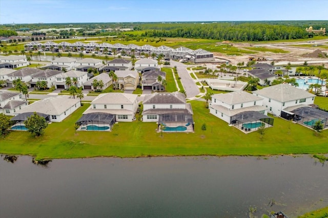 drone / aerial view with a water view