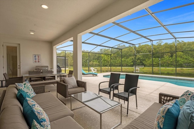 view of patio / terrace with an outdoor living space and a lanai