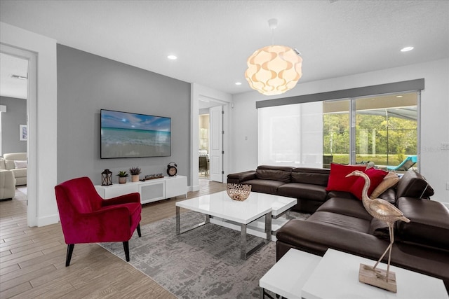 living room with hardwood / wood-style floors