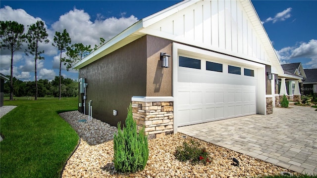 view of side of property with a yard