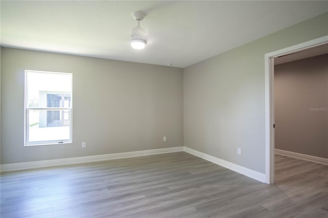 unfurnished room featuring light wood-type flooring