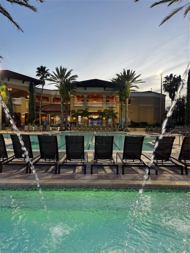 community pool with a patio