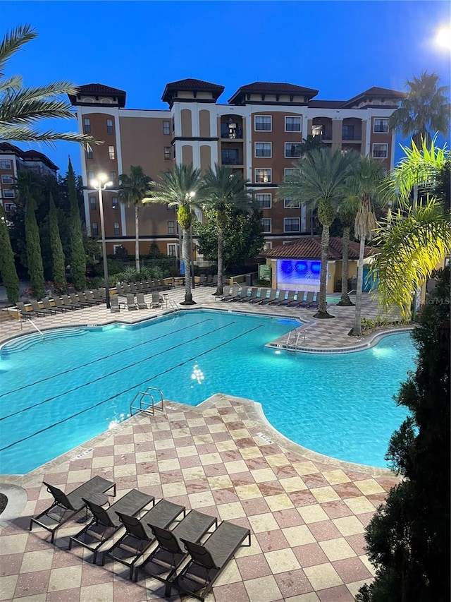 community pool featuring a patio area