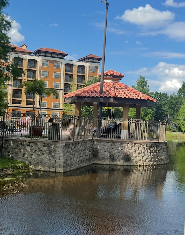 12521 Floridays Resort Dr Unit 302F, Orlando, FL 32821 - dock area featuring a gazebo and a water view