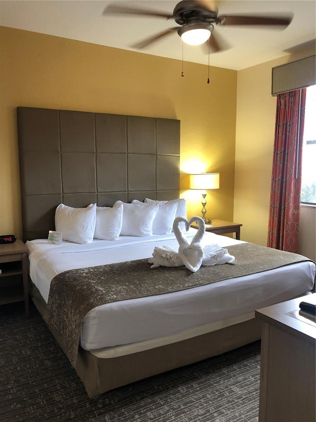 12521 Floridays Resort Dr Unit 302F, Orlando, FL 32821 - bedroom featuring ceiling fan