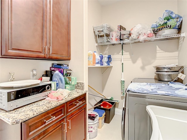 washroom with cabinets and tile floors