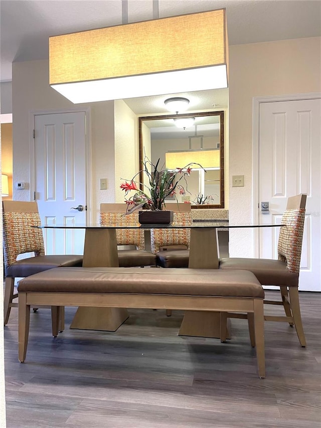 dining area featuring hardwood / wood-style floors