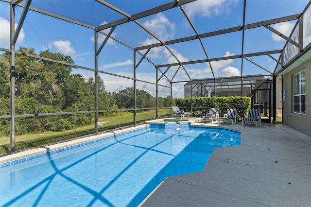 view of swimming pool with a patio, an in ground hot tub, and a lanai