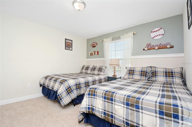 bedroom featuring light colored carpet