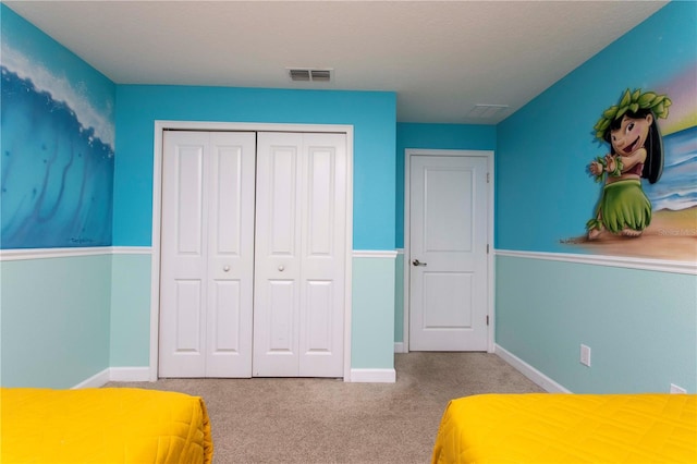 interior space with a closet and carpet floors