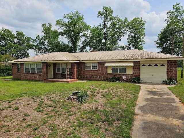 ranch-style home with a front yard and a garage