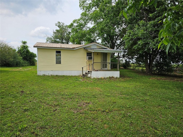 view of front of property with a front lawn