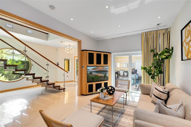 living room featuring a notable chandelier