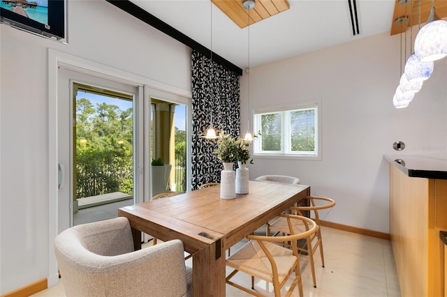 dining space with light tile patterned flooring