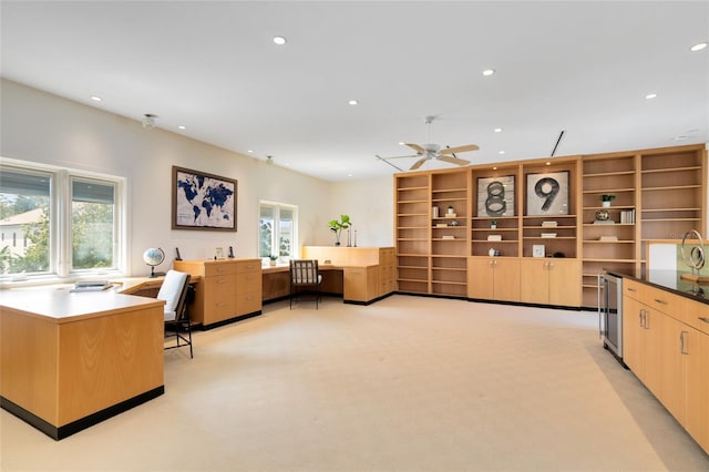 interior space featuring beverage cooler and ceiling fan