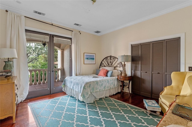 bedroom with ornamental molding, dark wood-type flooring, access to outside, and french doors