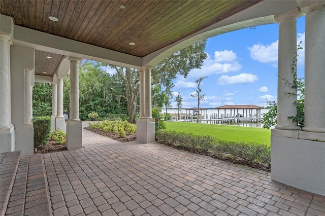 view of patio / terrace featuring a water view