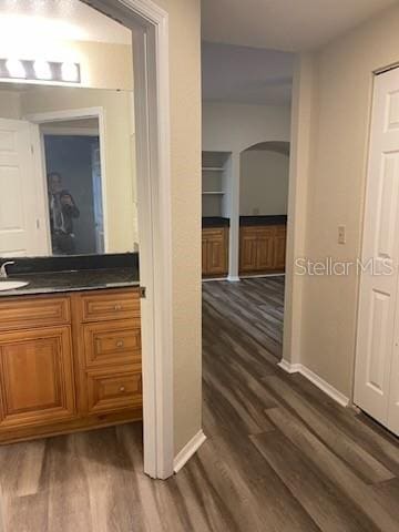 bathroom featuring vanity and hardwood / wood-style flooring