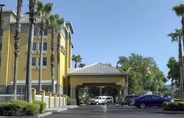 view of building exterior featuring a carport