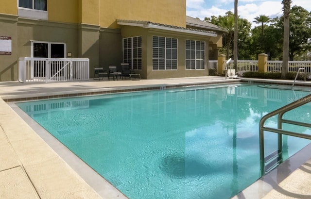 view of pool featuring a patio area