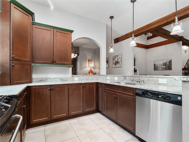 kitchen featuring light stone countertops, sink, stainless steel appliances, pendant lighting, and light tile patterned floors