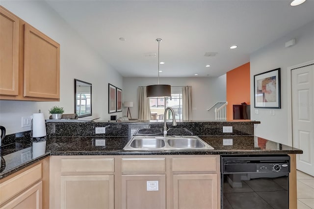 kitchen with a healthy amount of sunlight, light tile floors, dishwasher, and sink