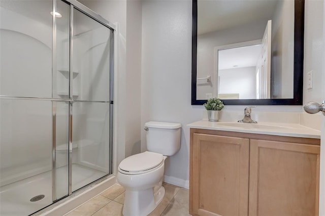 bathroom featuring toilet, tile floors, an enclosed shower, and oversized vanity