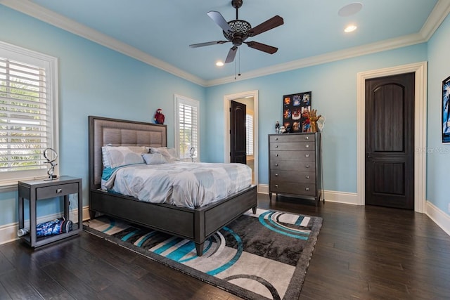 bedroom featuring ornamental molding, ceiling fan, and dark hardwood / wood-style flooring