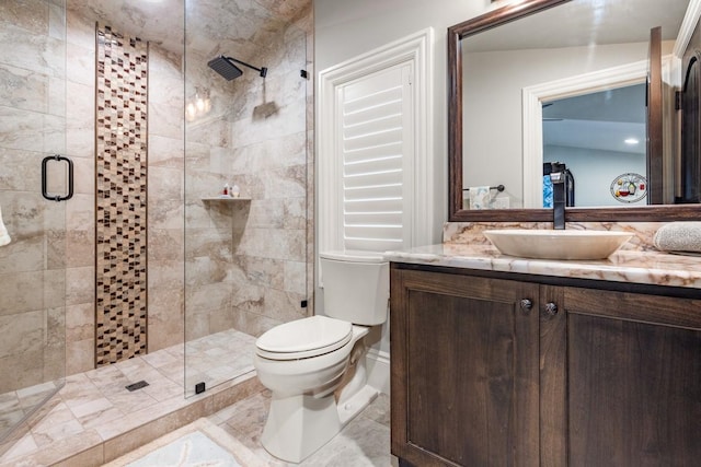 bathroom with walk in shower, toilet, vanity, and tile flooring