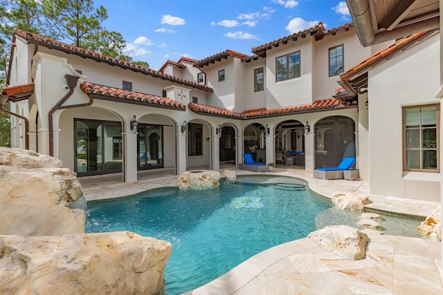 view of pool featuring a patio