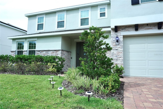 view of front of property with a front lawn