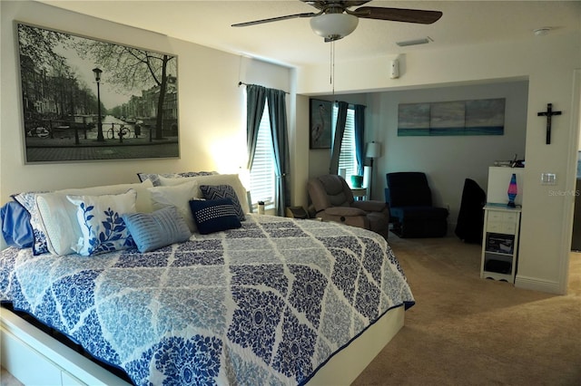 bedroom with carpet and ceiling fan