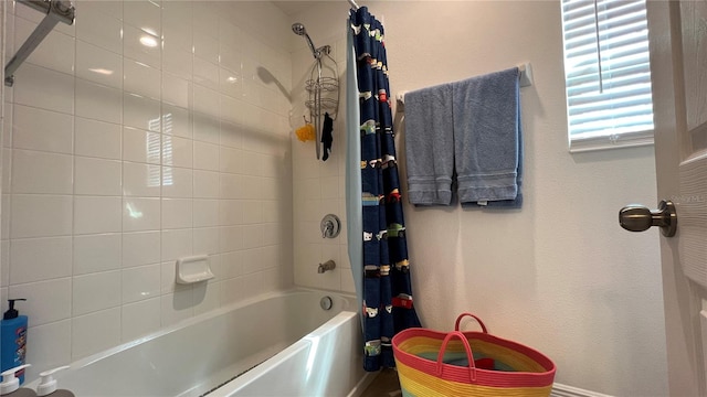 bathroom featuring shower / bath combination with curtain