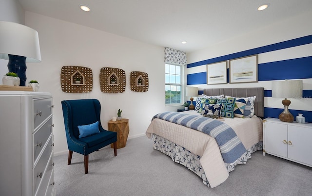 bedroom with light colored carpet