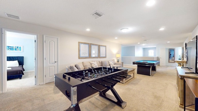 recreation room with light carpet and pool table