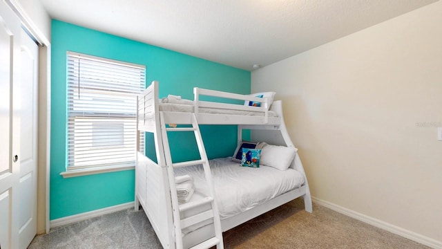 bedroom featuring carpet flooring