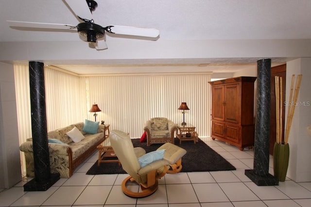 interior space with light tile flooring and ceiling fan