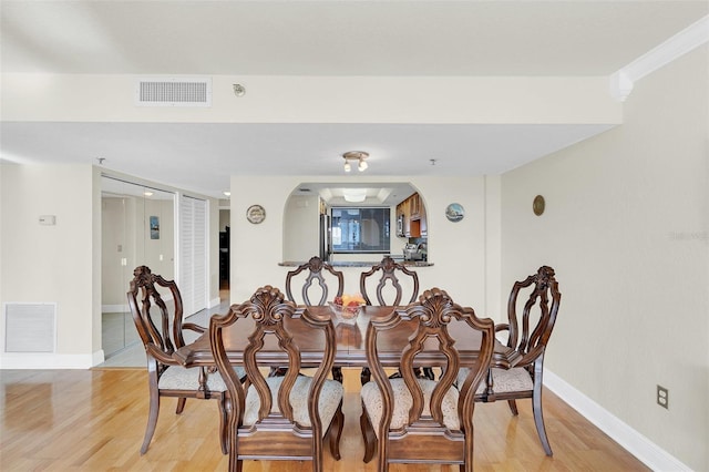 dining area with light wood-type flooring