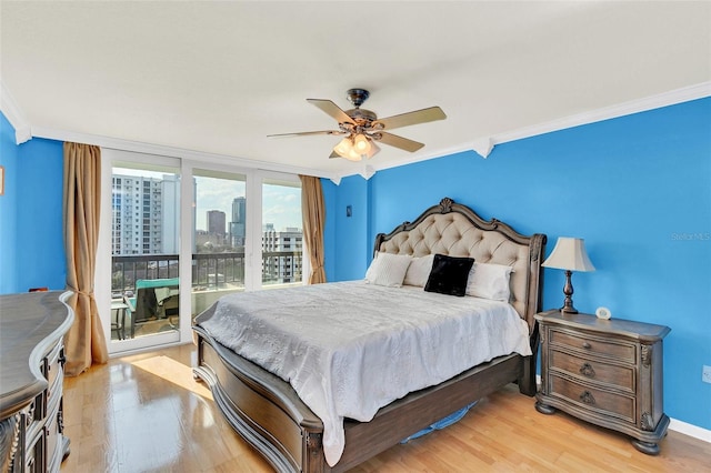 bedroom featuring crown molding, access to exterior, ceiling fan, and light wood-type flooring