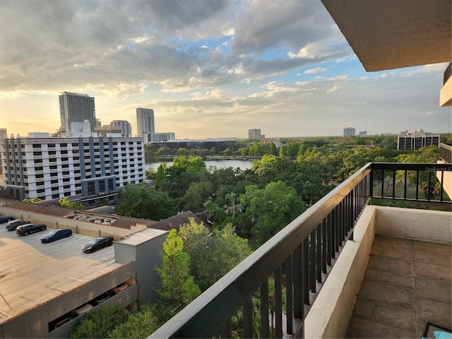 view of balcony at dusk