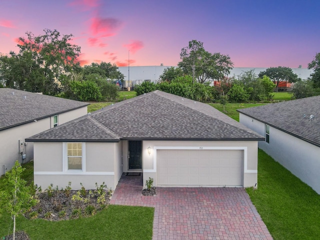 view of front of home featuring a garage