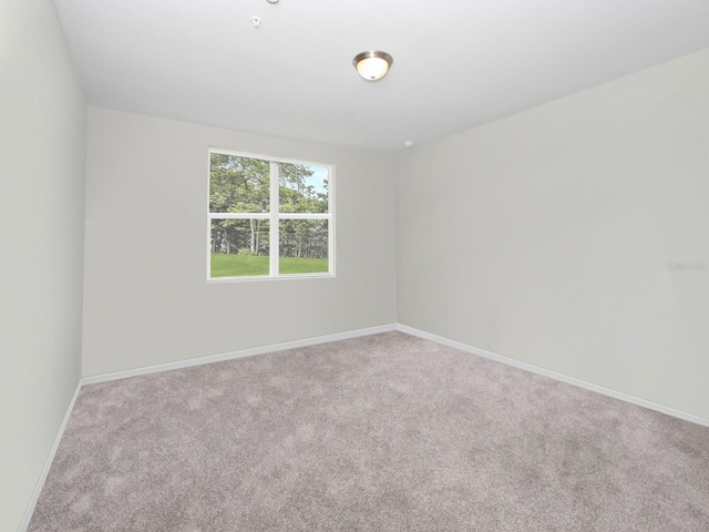 spare room with carpet flooring