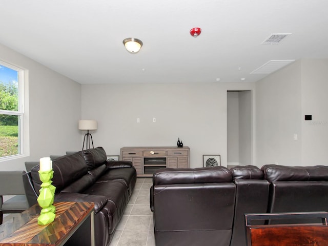 living room with light tile flooring