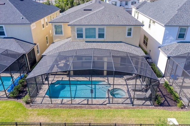 view of pool featuring a lanai and a patio area