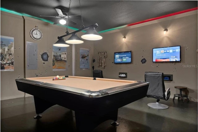 recreation room featuring electric panel, pool table, concrete floors, and ceiling fan